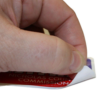 A sticker being peeled